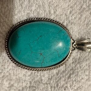 Turquoise Oval Pendant with Silver Trim